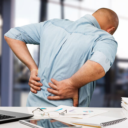 Man with back discomfort